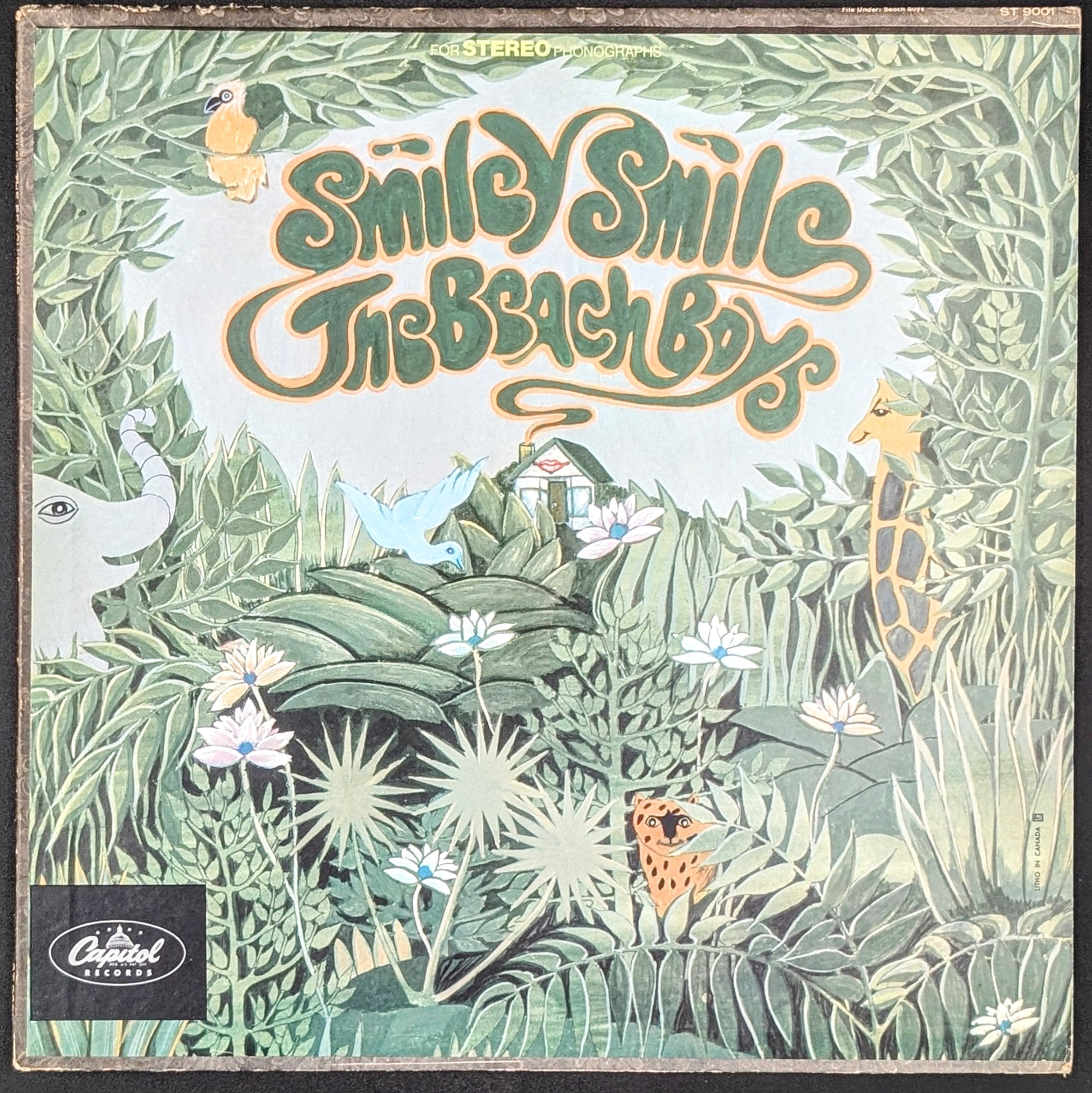 'Smiley Smile' by The Beach Boys with jungle scene and Capitol Records logo.