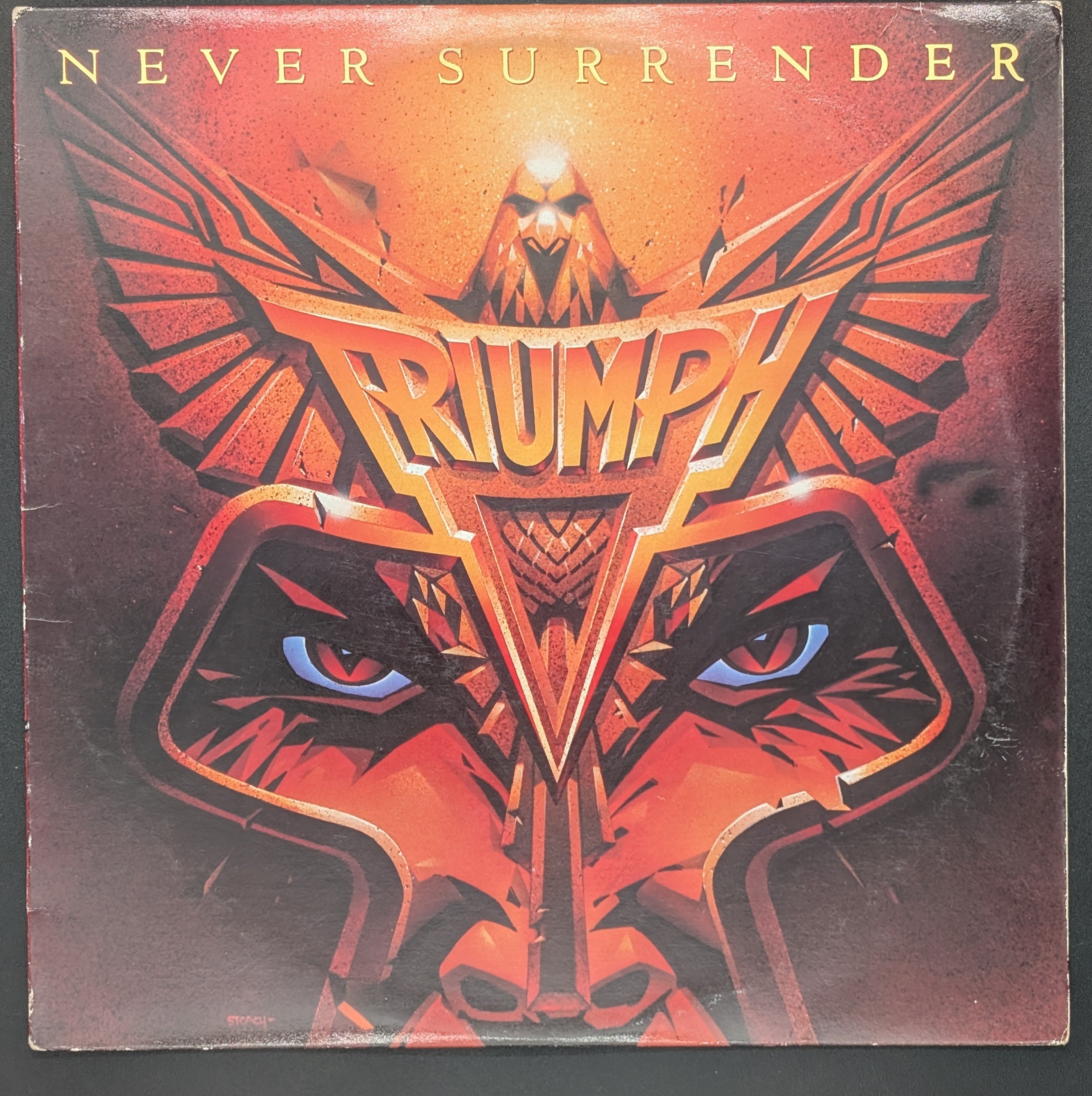 Triumph - Never Surrender
